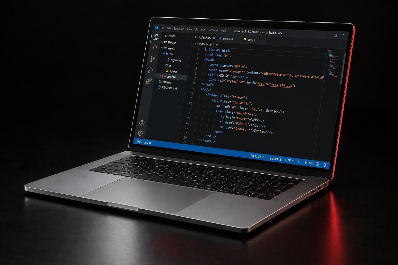 Ordinateur portable affichant Visual Studio Code avec un projet de site web